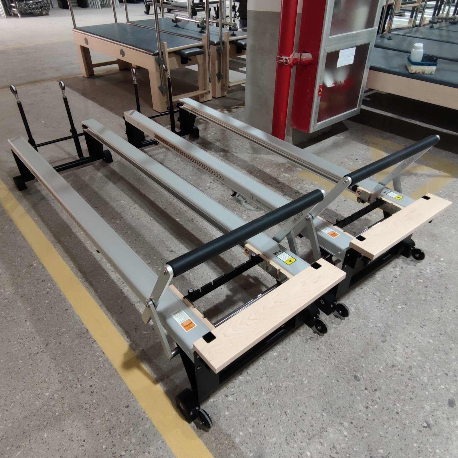 Premium Black Aluminum Pilates Reformer with Modern Studio Design