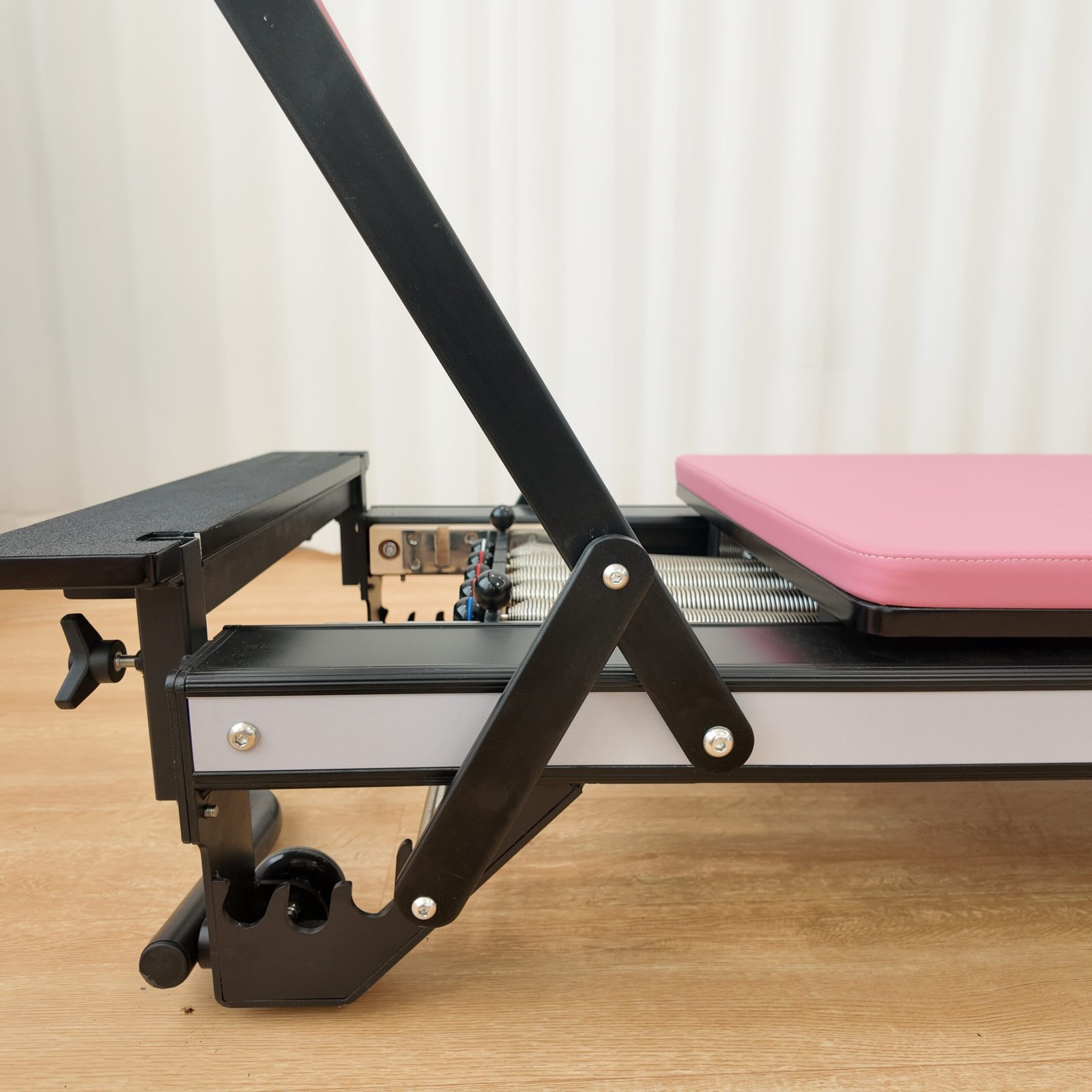 Premium Black Aluminum Pilates Reformer with Modern Studio Design