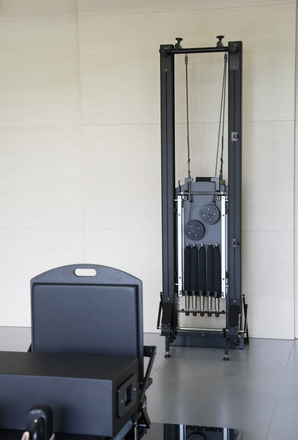 Premium Black Aluminum Pilates Reformer with Modern Studio Design
