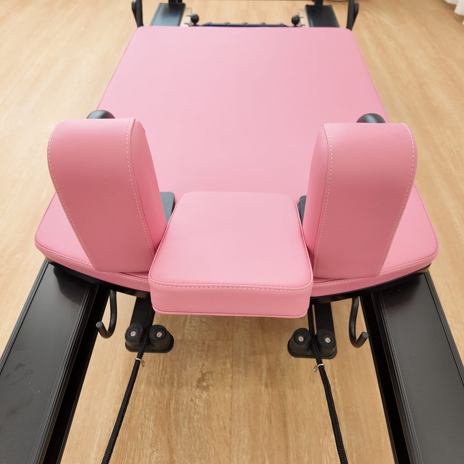 Premium Black Aluminum Pilates Reformer with Modern Studio Design