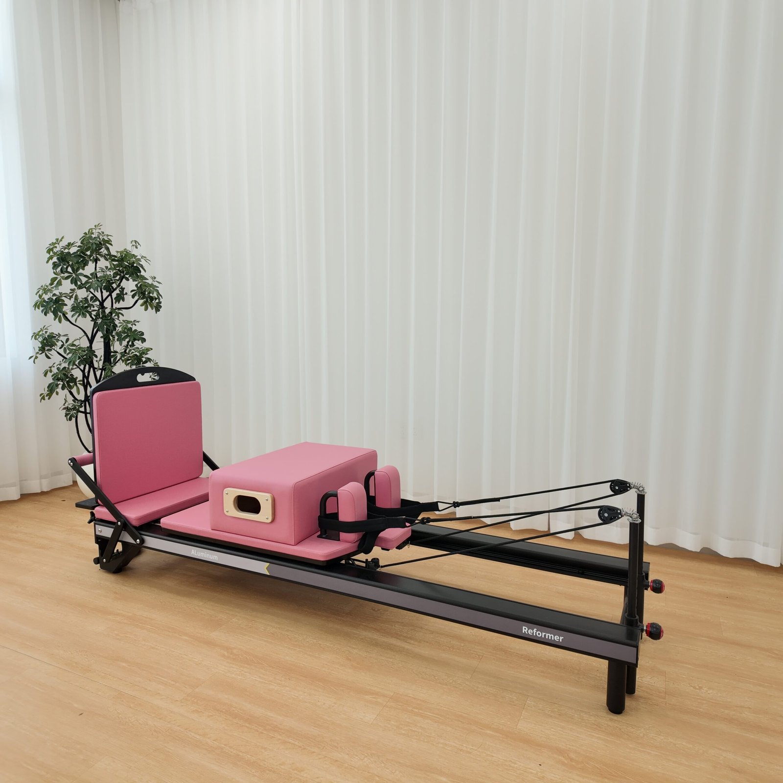 Premium Black Aluminum Pilates Reformer with Modern Studio Design