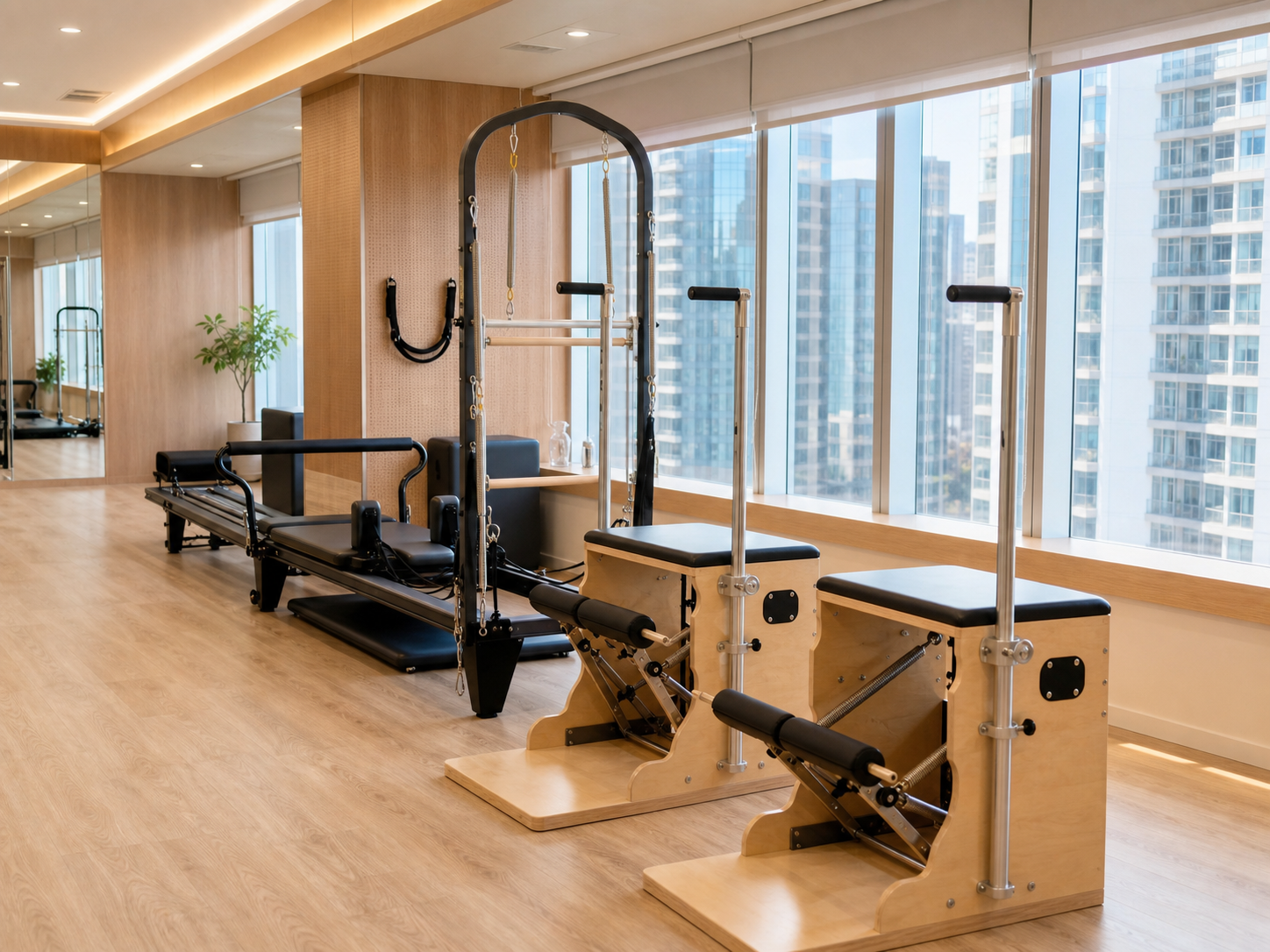 Instructor guided Pilates Reformer session in a professional wellness studio