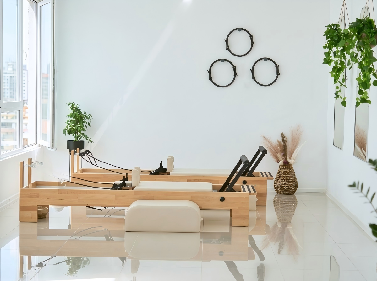 Gym Pilates area with commercial Reformer equipment